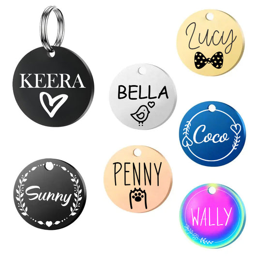 A collection of custom engraved round pet tags showcasing a variety of styles, including gold, black, silver, and rainbow colors, with different fonts and design icons.