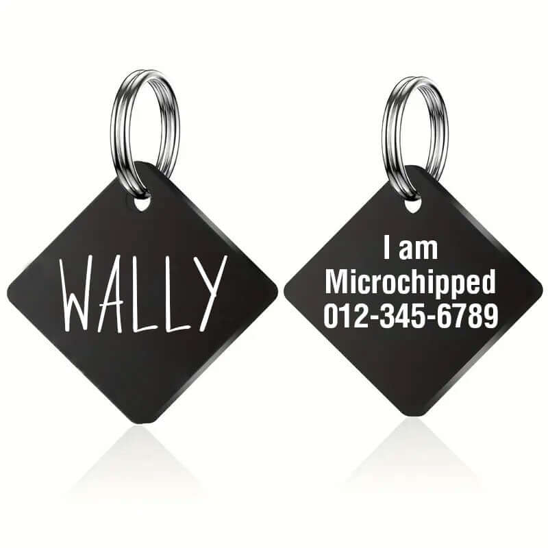Black stainless steel diamond-shaped pet ID tag engraved with the name 'Wally' on one side and 'I am Microchipped' with phone number on the other, ideal for secure pet identification.