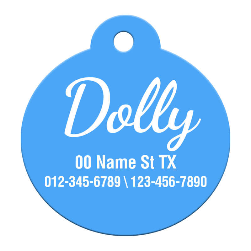 Vibrant blue round pet ID tag labeled 'Dolly' with full address and dual contact numbers, ensuring comprehensive pet safety