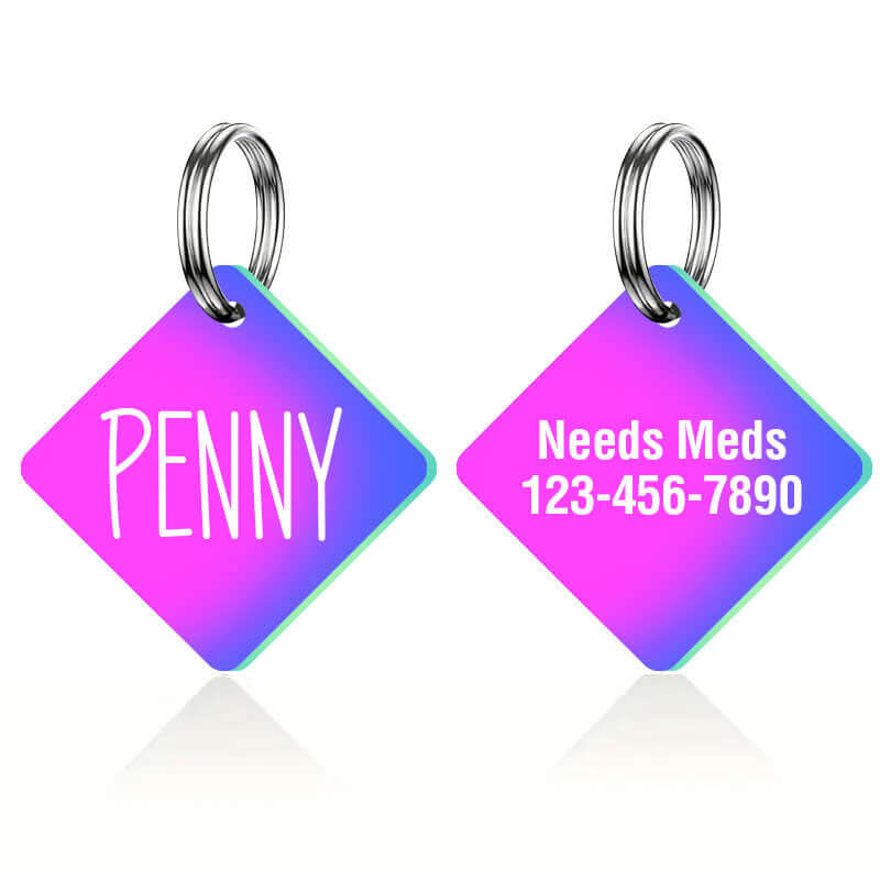 Bright stainless steel square pet ID tag in a diamond shape, engraved with name 'Penny' on one side and 'Needs Meds' with phone number on the other. Ideal for pets with medical conditions.