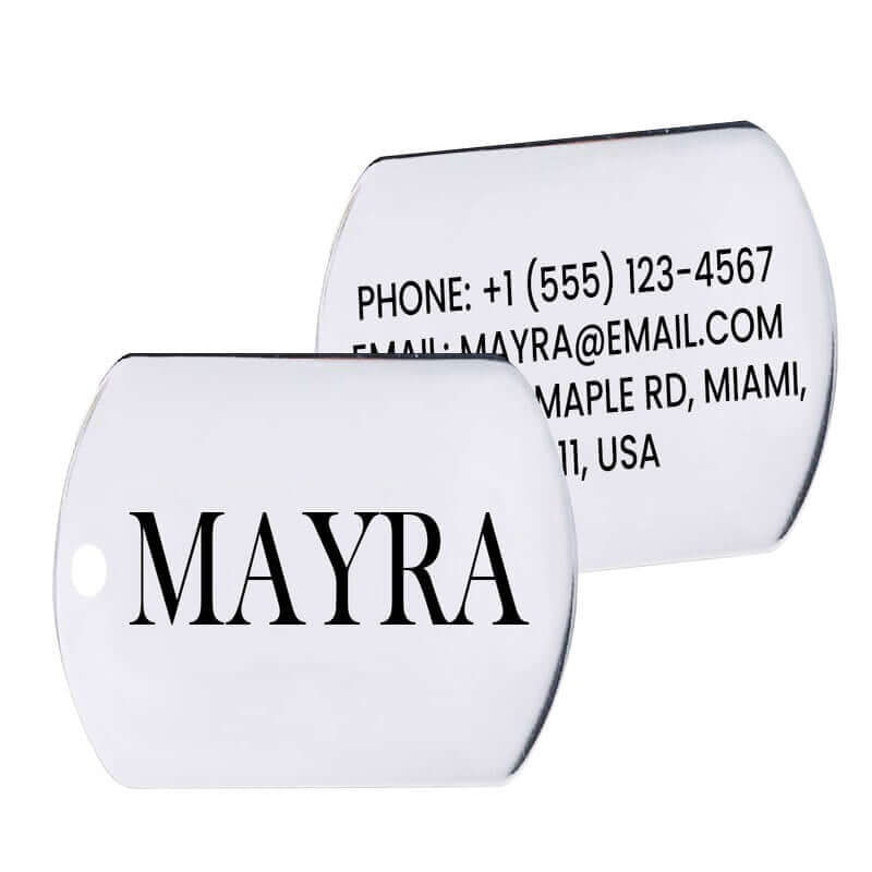 A custom engraved stainless steel military ID tag showing the front with a name, and the back with detailed contact information.