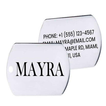 A custom engraved stainless steel military ID tag showing the front with a name, and the back with detailed contact information.